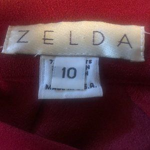RED ZELDA FLARED SLACKS